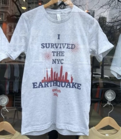A shirt spotted in a storefront window pokes fun at the severity of the earthquake.